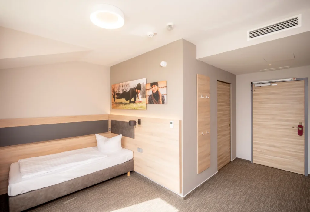 View of the bed in the single room