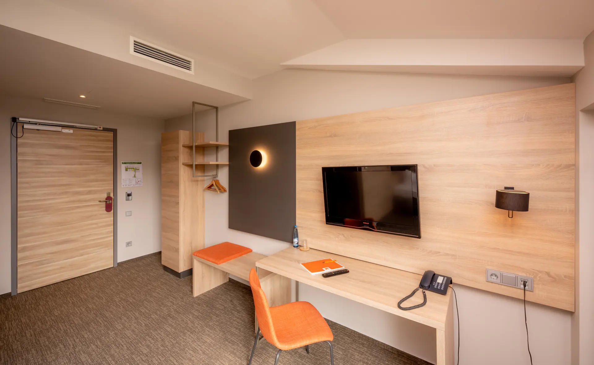 Desk and TV in one of the K6 rooms